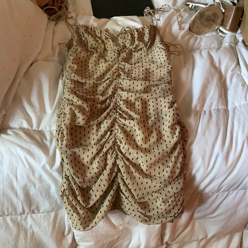 Tan and black fitted ruffled dress